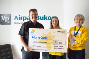 Haydn Davies hands over cheque to Lauren Edwards, Community Fundraiser and Sheena Clarke, a volunteer for the local Marie Curie fundraising group. Haydn Davies hands over cheque to Lauren Edwards, Community Fundraiser and Sheena Clarke, a volunteer for the local Marie Curie fundraising group.